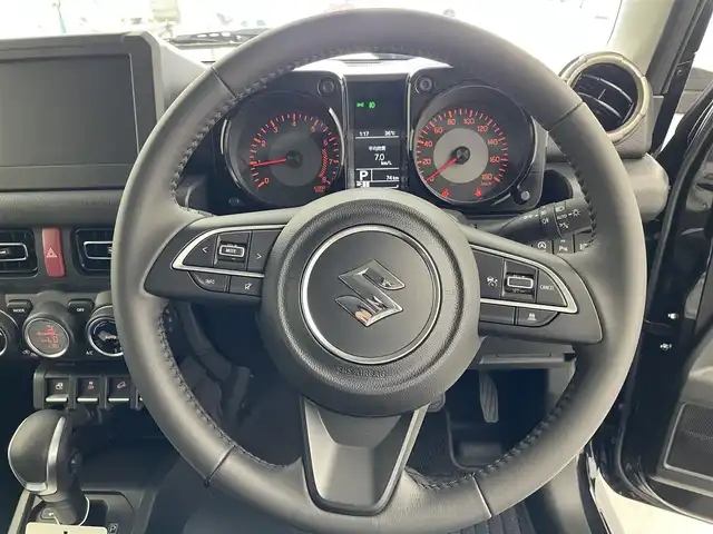 スズキ ジムニー ノマド FC 愛知県 2025(令7)年 0.1万km未満 黒 登録済み未使用車　/４WD　/スズキデュアルカメラサポート/コーナーセンサー　/アダプティブクルーズコントロール　/車線逸脱防止装置　/衝突軽減ブレーキ　/後方誤進抑制機能　/ステアリングリモコン　/革巻きステアリング　/フォグランプ　/ミラーヒーター　/シートヒーター　