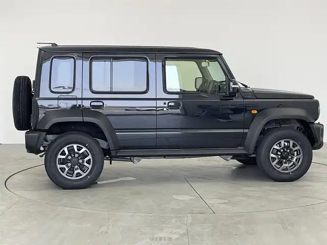 スズキ ジムニー ノマド FC 愛知県 2025(令7)年 0.1万km未満 黒 登録済み未使用車　/４WD　/スズキデュアルカメラサポート/コーナーセンサー　/アダプティブクルーズコントロール　/車線逸脱防止装置　/衝突軽減ブレーキ　/後方誤進抑制機能　/ステアリングリモコン　/革巻きステアリング　/フォグランプ　/ミラーヒーター　/シートヒーター　