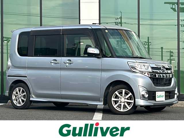 ダイハツ タント カスタム X SA 福岡県 2014(平26)年 6.2万km ブライトシルバーメタリック 純正SDナビ/FM/AM/CD/DVD/SD/BT/ワンセグTV/バックカメラ/スマートアシスト/両側パワースライドドア/LEDヘッドライト/オートライト/プッシュスタート/ETC/純正フロアマット/純正ドアバイザー/純正アルミホイール