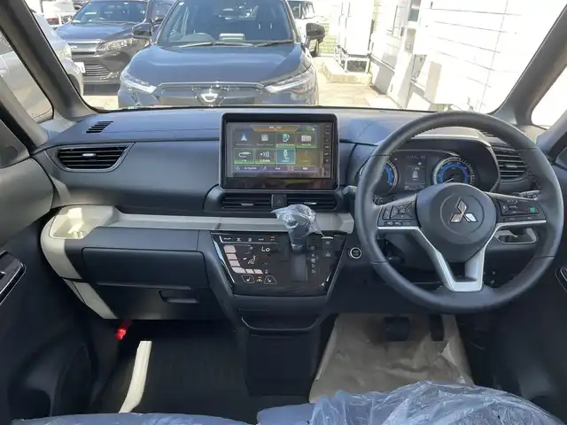 三菱 デリカミニ T プレミアム 石川県 2025(令7)年 0.1千km 緑Ⅱ 届出済未使用車/4WD/ターボ/純正9型ディスプレイオーディオ/CHAMONIXパッケージ/パノラマモニター/両側パワースライドドア/LEDヘッドライト/ゴムマット/マイパイロット/エマージェンシーブレーキ/専用ホイール/インテリキー/プッシュスタート/電動ミラー/オートエアコン/保証書