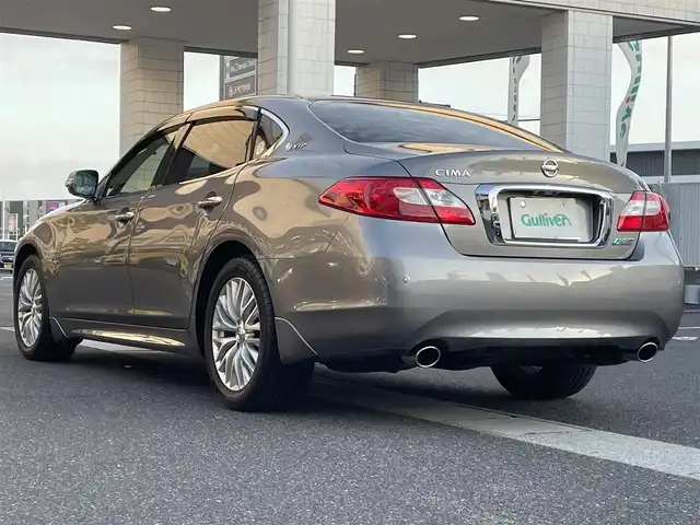 日産 シーマ ハイブリッド VIP G 岡山県 2015(平27)年 0.7万km ブレードシルバー 登録時走行距離6788km/ヘッドレスト後席モニター/BOSEサウンド/サンルーフ/純正HDDナビ/(AM/FM/TV/BT/DISC)/衝突被害軽減システム/クルーズコントロール/バックカメラ/ドライブレコーダー/WAC/全席シートヒーター/全席パワーシート/N席オットマン/シートメモリ/ビルトインETC/スマートキー/スペアキー/純正１８インチアルミホイール