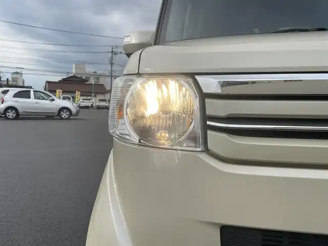 ホンダ Ｎ ＢＯＸ G Lパッケージ 山形県 2016(平28)年 7.7万km プレミアムアイボリーP 4WD/SDナビ/　　【CD DVD BT フルセグ USB】/バックカメラ/両側パワースライドドア/シートヒーター/アイドリングストップ/ステアリングスイッチ/電動格納ウィンカーミラー/ミラーヒーター/純正フロアマット/ドアバイザ―/スマートキー×2/ETC