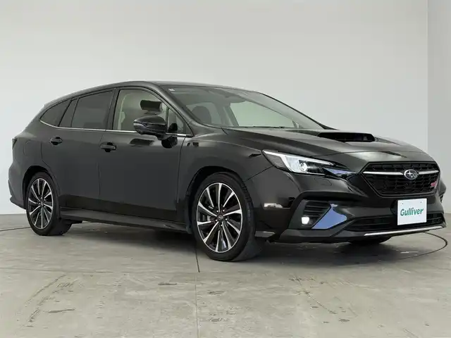 スバル レヴォーグ 1．8STIスポーツ EX 愛知県 2024(令6)年 2万km クリスタルブラックシリカ アイサイト/ハーマーカードン/11.6型純正縦型ナビ/・Bluetooth/・フルセグTV/・Applecarplay/・androidauto/アラウンドビューモニター/ドライブレコーダー/レーダークルーズコントロール/パワーバックドア/レザーシート/パワーシート（D/N）/シートヒーター（D/N）/革巻きステアリング/ステアリングリモコン/パドルシフト/電動パーキングシステム/ETC/純正フロアマット/純正アルミホイール/フォグランプ/ディライト