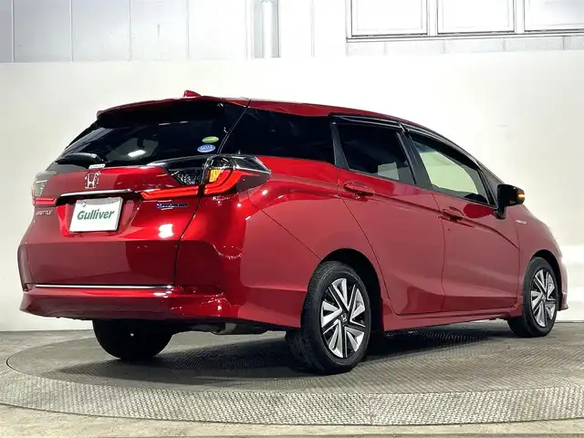 ホンダ シャトル ハイブリッド X ホンダセンシング 大阪府 2019(令1)年 2.2万km プレミアムクリスタルレッドM 純正ナビ(フルセグ/DVD再生/Bluetooth) バックカメラ ETC ハーフレザー シートヒーター 衝突軽減 レーダークルコン パドルシフト オートライト スマートキー ドラレコ