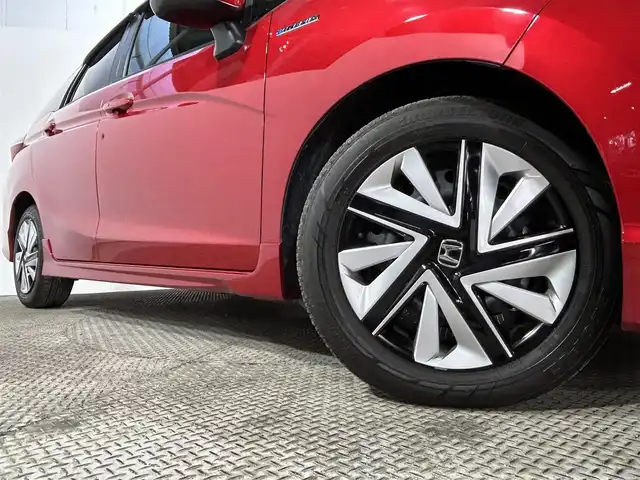 ホンダ シャトル ハイブリッド X ホンダセンシング 大阪府 2019(令1)年 2.2万km プレミアムクリスタルレッドM 純正ナビ(フルセグ/DVD再生/Bluetooth) バックカメラ ETC ハーフレザー シートヒーター 衝突軽減 レーダークルコン パドルシフト オートライト スマートキー ドラレコ