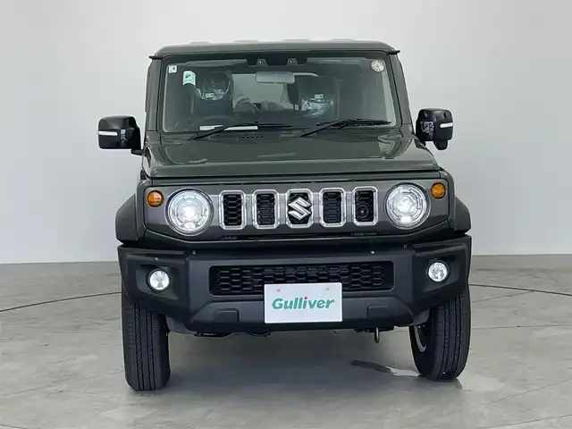 スズキ ジムニー ノマド FC 愛知県 2025(令7)年 0.1万km未満 緑 登録済み未使用車　/前席シートヒーター/スズキセーフティサポート/・スズキデュアルカメラサポート/・コーナーセンサー　/・アダプティブクルーズコントロール　/・車線逸脱防止装置　/・後方誤進抑制機能　/・先行車発進お知らせ機能/・標識認識機能/ダウンヒルアシストコントロール/トランスフォーレバー/ステアリングリモコン　/革巻きステアリング　/フォグランプ　/ミラーヒーター　/純正フロアマット/純正15インチAW/純正LEDヘッドランプ/　