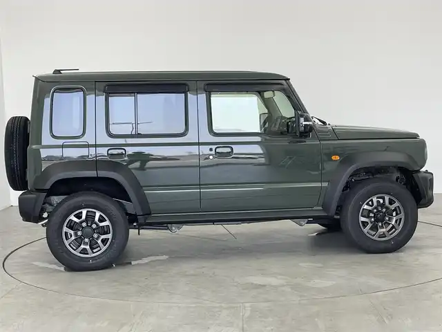 スズキ ジムニー ノマド FC 愛知県 2025(令7)年 0.1万km未満 緑 登録済み未使用車　/前席シートヒーター/スズキセーフティサポート/・スズキデュアルカメラサポート/・コーナーセンサー　/・アダプティブクルーズコントロール　/・車線逸脱防止装置　/・後方誤進抑制機能　/・先行車発進お知らせ機能/・標識認識機能/ダウンヒルアシストコントロール/トランスフォーレバー/ステアリングリモコン　/革巻きステアリング　/フォグランプ　/ミラーヒーター　/純正フロアマット/純正15インチAW/純正LEDヘッドランプ/　