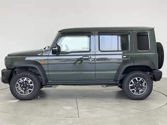 スズキ ジムニー ノマド FC 愛知県 2025(令7)年 0.1万km未満 緑 登録済み未使用車　/前席シートヒーター/スズキセーフティサポート/・スズキデュアルカメラサポート/・コーナーセンサー　/・アダプティブクルーズコントロール　/・車線逸脱防止装置　/・後方誤進抑制機能　/・先行車発進お知らせ機能/・標識認識機能/ダウンヒルアシストコントロール/トランスフォーレバー/ステアリングリモコン　/革巻きステアリング　/フォグランプ　/ミラーヒーター　/純正フロアマット/純正15インチAW/純正LEDヘッドランプ/　