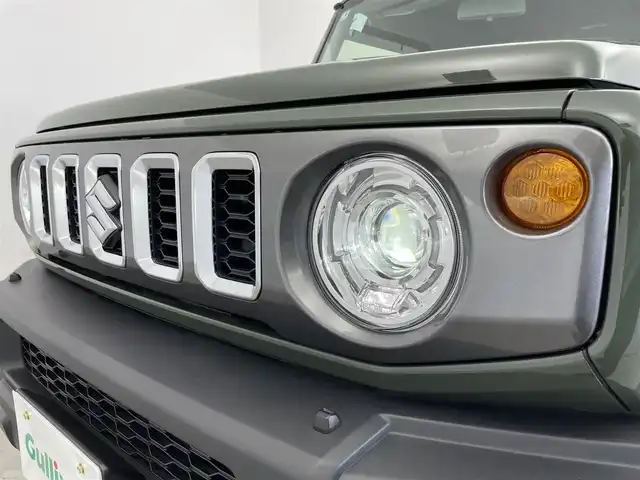 スズキ ジムニー ノマド FC 愛知県 2025(令7)年 0.1万km未満 緑 登録済み未使用車　/前席シートヒーター/スズキセーフティサポート/・スズキデュアルカメラサポート/・コーナーセンサー　/・アダプティブクルーズコントロール　/・車線逸脱防止装置　/・後方誤進抑制機能　/・先行車発進お知らせ機能/・標識認識機能/ダウンヒルアシストコントロール/トランスフォーレバー/ステアリングリモコン　/革巻きステアリング　/フォグランプ　/ミラーヒーター　/純正フロアマット/純正15インチAW/純正LEDヘッドランプ/　