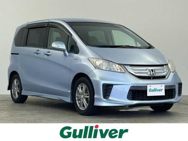ホンダ フリード ハイブリット ジャストセレクション 千葉県 2011(平23)年 9.3万km プレミアムブルーオパールメタリック 禁煙車/片側電動ドア/純正メモリナビ/・型番：VXM-118VS/・CD/DVD/ワンセグTV/・ETC/・バックカメラ/クルーズコントロール/純正フロアマット/純正ドアバイザー/社外15インチAW/電動格納ウインカーミラー/オートライト/・キセノンヘッドライト/スマートキー