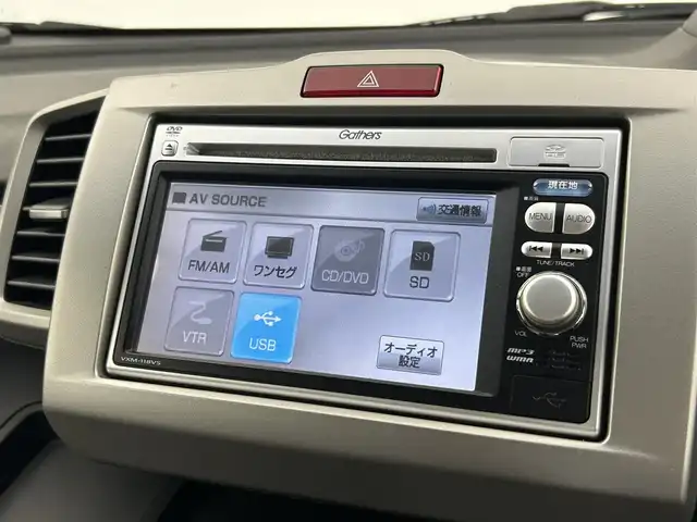 ホンダ フリード ハイブリット ジャストセレクション 千葉県 2011(平23)年 9.3万km プレミアムブルーオパールメタリック 禁煙車/片側電動ドア/純正メモリナビ/・型番：VXM-118VS/・CD/DVD/ワンセグTV/・ETC/・バックカメラ/クルーズコントロール/純正フロアマット/純正ドアバイザー/社外15インチAW/電動格納ウインカーミラー/オートライト/・キセノンヘッドライト/スマートキー