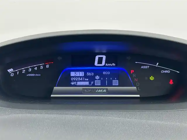 ホンダ フリード ハイブリット ジャストセレクション 千葉県 2011(平23)年 9.3万km プレミアムブルーオパールメタリック 禁煙車/片側電動ドア/純正メモリナビ/・型番：VXM-118VS/・CD/DVD/ワンセグTV/・ETC/・バックカメラ/クルーズコントロール/純正フロアマット/純正ドアバイザー/社外15インチAW/電動格納ウインカーミラー/オートライト/・キセノンヘッドライト/スマートキー