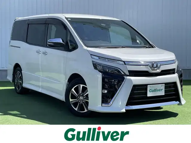 トヨタ ヴォクシー ZS 煌Ⅱ 香川県 2019(令1)年 6.7万km ホワイトパールクリスタルシャイン カロッツェリア８型ナビ/カロッツェリアフリップダウンモニター/バックカメラ/両側パワースライドドア/トヨタセーフティーセンス/クルーズコントロール/前後コーナーセンサー/前後ドラレコ/ＥＴＣ/ＬＥＤヘッドライト/フォグライト/純正16インチAW/純正フロアマット/純正ドアバイザー/スマートキー