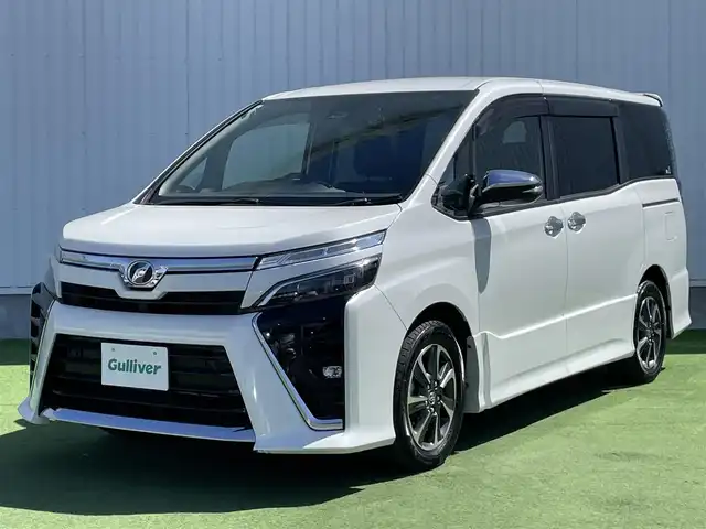 トヨタ ヴォクシー ZS 煌Ⅱ 香川県 2019(令1)年 6.7万km ホワイトパールクリスタルシャイン カロッツェリア８型ナビ/カロッツェリアフリップダウンモニター/バックカメラ/両側パワースライドドア/トヨタセーフティーセンス/クルーズコントロール/前後コーナーセンサー/前後ドラレコ/ＥＴＣ/ＬＥＤヘッドライト/フォグライト/純正16インチAW/純正フロアマット/純正ドアバイザー/スマートキー