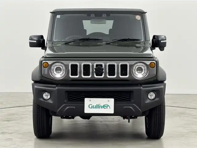 スズキ ジムニー ノマド FC 福岡県 2025(令7)年 0.1万km ジャングルグリーン 社外ＤＡ　/バックカメラ　/ＥＴＣ　/衝突被害軽減　/レーダークルーズコントロール　/コーナーセンサー　/レーンキープ　/横滑り防止装置　/アイドリングストップ　/シートヒーター　/盗難防止装置　/純正１５インチＡＷ