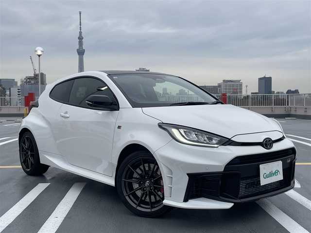 トヨタ ＧＲヤリス RZ ハイパフォーマンス 東京都 2025(令7)年 1.8万km スーパーホワイトⅡ 法人ワンオーナー/4WD/純正マルチナビ（BT/地デジTV）/バックカメラ/JBLスピーカー/純正１８インチアルミ/ハーフレザーシート/シートヒーター/ステアリングヒーター/パドルシフト/ビルトインETC２．０/エンジンプッシュボタン/スマートキー/Toyota　Safety Sense/AHB（オートマチックハイビーム）/PCS（プリクラッシュセーフティー）/LTA（レーントレーシングアシスト）/LDA（レーンディパーチャーアラート）/発進遅れ告知機能/RSA(ロードサインアシスト）/レーダークルーズコントロール/保証書・取説・ナビ説