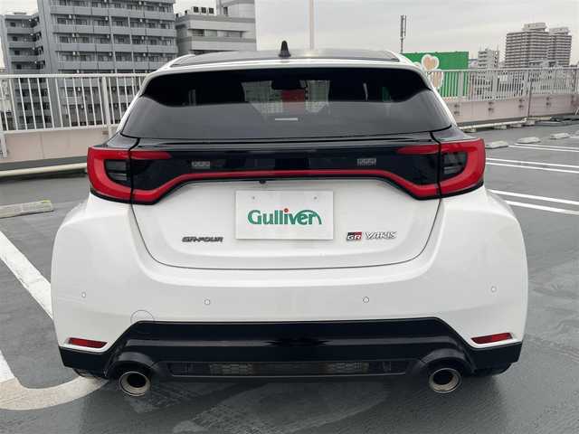 トヨタ ＧＲヤリス RZ ハイパフォーマンス 東京都 2025(令7)年 1.8万km スーパーホワイトⅡ 法人ワンオーナー/4WD/純正マルチナビ（BT/地デジTV）/バックカメラ/JBLスピーカー/純正１８インチアルミ/ハーフレザーシート/シートヒーター/ステアリングヒーター/パドルシフト/ビルトインETC２．０/エンジンプッシュボタン/スマートキー/Toyota　Safety Sense/AHB（オートマチックハイビーム）/PCS（プリクラッシュセーフティー）/LTA（レーントレーシングアシスト）/LDA（レーンディパーチャーアラート）/発進遅れ告知機能/RSA(ロードサインアシスト）/レーダークルーズコントロール/保証書・取説・ナビ説