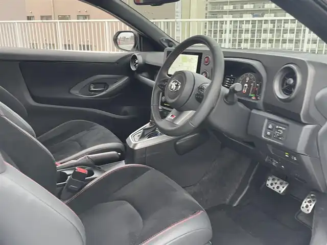 トヨタ ＧＲヤリス RZ ハイパフォーマンス 東京都 2025(令7)年 1.8万km スーパーホワイトⅡ 法人ワンオーナー/4WD/純正マルチナビ（BT/地デジTV）/バックカメラ/JBLスピーカー/純正１８インチアルミ/ハーフレザーシート/シートヒーター/ステアリングヒーター/パドルシフト/ビルトインETC２．０/エンジンプッシュボタン/スマートキー/Toyota　Safety Sense/AHB（オートマチックハイビーム）/PCS（プリクラッシュセーフティー）/LTA（レーントレーシングアシスト）/LDA（レーンディパーチャーアラート）/発進遅れ告知機能/RSA(ロードサインアシスト）/レーダークルーズコントロール/保証書・取説・ナビ説