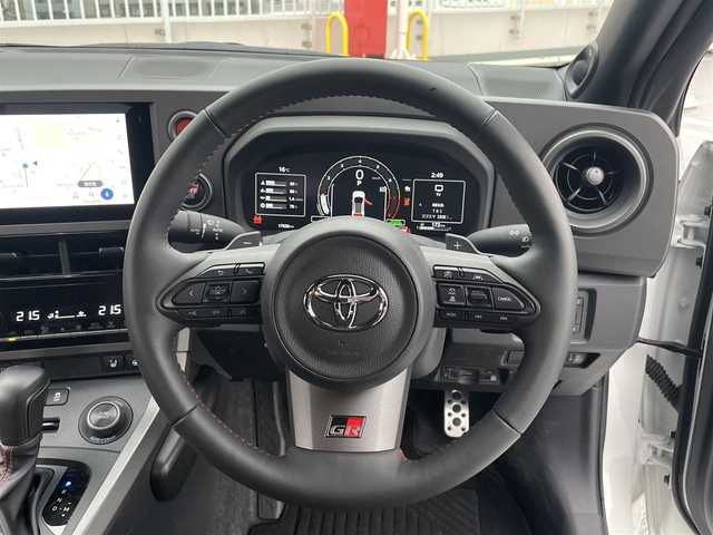 トヨタ ＧＲヤリス RZ ハイパフォーマンス 東京都 2025(令7)年 1.8万km スーパーホワイトⅡ 法人ワンオーナー/4WD/純正マルチナビ（BT/地デジTV）/バックカメラ/JBLスピーカー/純正１８インチアルミ/ハーフレザーシート/シートヒーター/ステアリングヒーター/パドルシフト/ビルトインETC２．０/エンジンプッシュボタン/スマートキー/Toyota　Safety Sense/AHB（オートマチックハイビーム）/PCS（プリクラッシュセーフティー）/LTA（レーントレーシングアシスト）/LDA（レーンディパーチャーアラート）/発進遅れ告知機能/RSA(ロードサインアシスト）/レーダークルーズコントロール/保証書・取説・ナビ説
