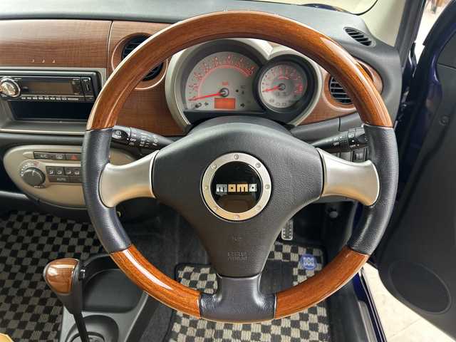 ダイハツ ミラ ジーノ プレミアムX 鹿児島県 2007(平19)年 2万km プレシャスブルーマイカメタリック 純正オーディオ/(CD/AM/FM/USB)/ワンオーナー/momoステアリング/純正フロアマット/純正14インチアルミホイール/ハーフレザーシート/パワーウィンドウ/パワーステアリング/電格ミラー/保証書/取扱説明書