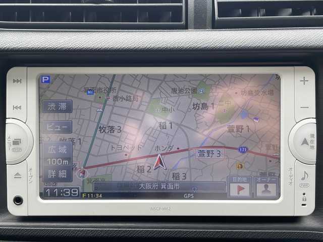 トヨタ アクア G 大阪府 2012(平24)年 1.7万km ライムホワイトパールクリスタルシャイン ワンオーナー/純正メモリナビ/・AM/FM/CD/DVD/Bluetooth/・ワンセグテレビ/盗難防止装置/シートヒーター（D席+N席）/キセノンヘッドライト/オートライト/オートエアコン/プッシュスタートボタン/スマートキー×2/ステアリングリモコン/12V充電器/純正フロアマット/ドアバイザー/保証書/取扱説明書/ナビ取扱説明書