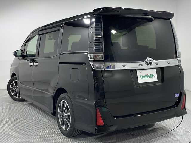トヨタ ヴォクシー ZS 煌Ⅲ 広島県 2021(令3)年 2.8万km イナズマスパーキングブラックガラスフレーク 純正10型ナビ/両側パワースライドドア/バックカメラ/クリアランスソナー/クルーズコントロール/セーフティセンス/・プリクラッシュセーフティ/・レーンディパーチャーアラート/・オートマチックハイビーム/LEDヘッドランプ/純正16インチAW/ETC/ドライブレコーダー
