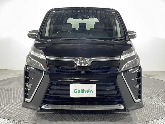 トヨタ ヴォクシー ZS 煌Ⅲ 広島県 2021(令3)年 2.8万km イナズマスパーキングブラックガラスフレーク 純正10型ナビ/両側パワースライドドア/バックカメラ/クリアランスソナー/クルーズコントロール/セーフティセンス/・プリクラッシュセーフティ/・レーンディパーチャーアラート/・オートマチックハイビーム/LEDヘッドランプ/純正16インチAW/ETC/ドライブレコーダー