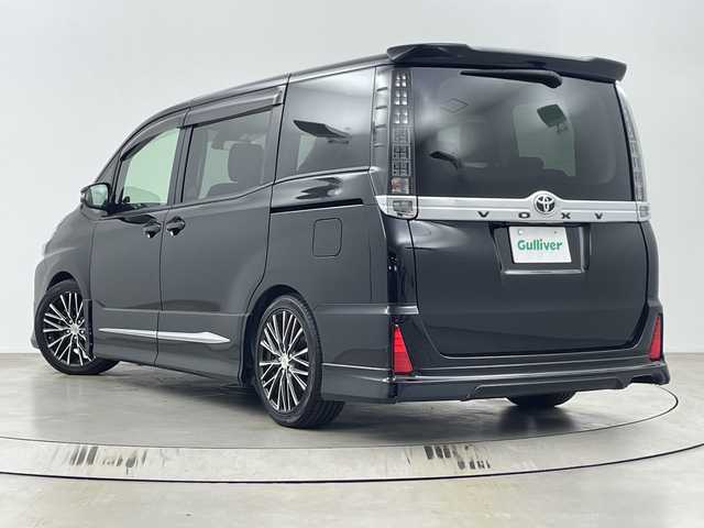 トヨタ ヴォクシー ZS 埼玉県 2017(平29)年 5.2万km ブラック フルモデリスタエアロ/社外フリップダウンモニター/社外11インチナビ　EX11V/(Bluetooth/CD/DVD/HDMI/USB/AM/FM)/地デジフルセグ/バックカメラ/前方ドライブレコーダー/ETC/車線逸脱警報/衝突軽減ブレーキ/オートマチックハイビーム/先行車発進お知らせ機能/ECOモード/ロールサンシェード/レーダー探知機　ZERO 702V/電動格納ミラー・ウィンカーミラー/フロントフォグランプ/プッシュスタート/ステアリングリモコン/社外フロアマット/純正ドアバイザー/社外18インチアルミホイール