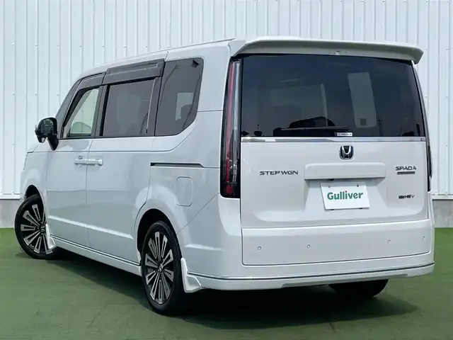 ホンダ ステップワゴン スパーダ eHEV プレミアムライン 香川県 2022(令4)年 3.8万km プラチナホワイトパール 登録時走行距離：37596km/純正11.4型ナビ/　CD DVD BT フルセグTV/全方位カメラ/前後ドライブレコーダー/ビルトインETC/両側パワースライドドア/パワーバックドア/衝突被害軽減装置/レーンキープアシスト/レーダークルーズコントロール/クリアランスソナー/ブラインドスポットモニター/LEDヘッドライト/オートライト/フォグランプ/ハーフレザーシート/シートヒーター/ロールサンシェード/ISOFIX/オーバーヘッドコンソール/革巻きステアリング/ステアリングスイッチ/パドルシフト/プッシュスタート/スマートキー