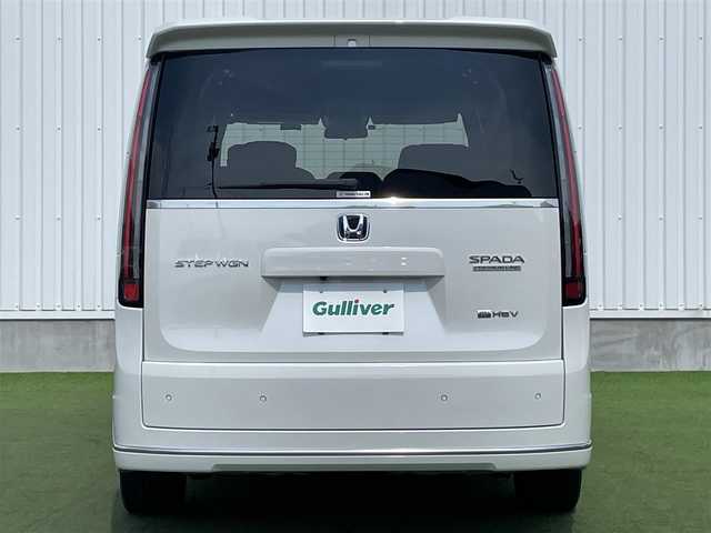 ホンダ ステップワゴン スパーダ eHEV プレミアムライン 香川県 2022(令4)年 3.8万km プラチナホワイトパール 登録時走行距離：37596km/純正11.4型ナビ/　CD DVD BT フルセグTV/全方位カメラ/前後ドライブレコーダー/ビルトインETC/両側パワースライドドア/パワーバックドア/衝突被害軽減装置/レーンキープアシスト/レーダークルーズコントロール/クリアランスソナー/ブラインドスポットモニター/LEDヘッドライト/オートライト/フォグランプ/ハーフレザーシート/シートヒーター/ロールサンシェード/ISOFIX/オーバーヘッドコンソール/革巻きステアリング/ステアリングスイッチ/パドルシフト/プッシュスタート/スマートキー