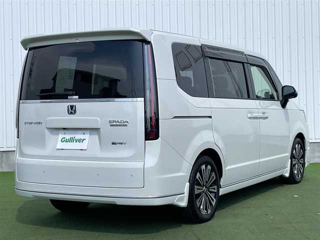 ホンダ ステップワゴン スパーダ eHEV プレミアムライン 香川県 2022(令4)年 3.8万km プラチナホワイトパール 登録時走行距離：37596km/純正11.4型ナビ/　CD DVD BT フルセグTV/全方位カメラ/前後ドライブレコーダー/ビルトインETC/両側パワースライドドア/パワーバックドア/衝突被害軽減装置/レーンキープアシスト/レーダークルーズコントロール/クリアランスソナー/ブラインドスポットモニター/LEDヘッドライト/オートライト/フォグランプ/ハーフレザーシート/シートヒーター/ロールサンシェード/ISOFIX/オーバーヘッドコンソール/革巻きステアリング/ステアリングスイッチ/パドルシフト/プッシュスタート/スマートキー