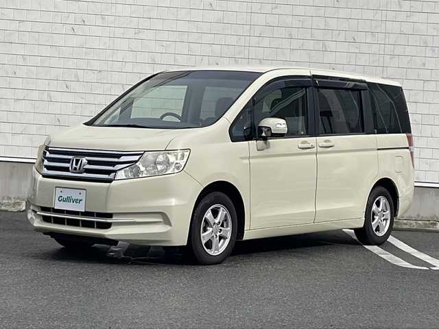 ホンダ ステップワゴン G コンフォートセレクション 山形県 2012(平24)年 5.4万km ヒダマリアイボリーパール 純正HDDナビ/(DVD/ワンセグ/MSV/USB)/バックカメラ/両側パワースライドドア/クルーズコントロール/アイドリングストップ/ステアリングスイッチ/ビルトインETC/HIDヘッドライト/フロアマット/ドアバイザー/ウィンカーミラー/スマートキー