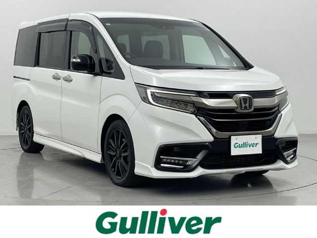 ホンダ ステップワゴン モデューロX ホンダセンシング 熊本県 2020(令2)年 4.4万km プラチナホワイトパール ワンオーナー/純正ナビVXU-207Wi（ＣＤ・ＤＶＤ・フルセグ・ＢＴ・ＳＤ・ＡｐｐｌＣａｒＰｌａｙ・ＵＳＢ）/全周囲カメラ　/バックカメラ/フロントカメラ/純正前方ドライブレコーダー　/純正フリップダウンモニター/ビルトインＥＴＣ２．０　/両側パワースライドドア　/アダブティブクルーズコントロール/衝突軽減ブレーキ/レーンキープアシスト/車線逸脱警報/横滑り防止/アイドリングストップ/ハーフレザーシート/純正フロアマット/社外１７インチAW/オートライト/LEDヘッドライト/フォグランプ/スマートキー/プッシュスタート/スペアキー1本/保証書/取扱説明書