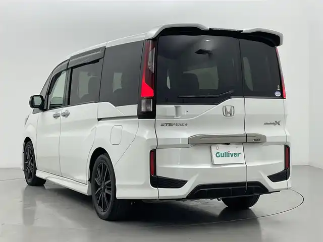 ホンダ ステップワゴン モデューロX ホンダセンシング 熊本県 2020(令2)年 4.4万km プラチナホワイトパール ワンオーナー/純正ナビVXU-207Wi（ＣＤ・ＤＶＤ・フルセグ・ＢＴ・ＳＤ・ＡｐｐｌＣａｒＰｌａｙ・ＵＳＢ）/全周囲カメラ　/バックカメラ/フロントカメラ/純正前方ドライブレコーダー　/純正フリップダウンモニター/ビルトインＥＴＣ２．０　/両側パワースライドドア　/アダブティブクルーズコントロール/衝突軽減ブレーキ/レーンキープアシスト/車線逸脱警報/横滑り防止/アイドリングストップ/ハーフレザーシート/純正フロアマット/社外１７インチAW/オートライト/LEDヘッドライト/フォグランプ/スマートキー/プッシュスタート/スペアキー1本/保証書/取扱説明書