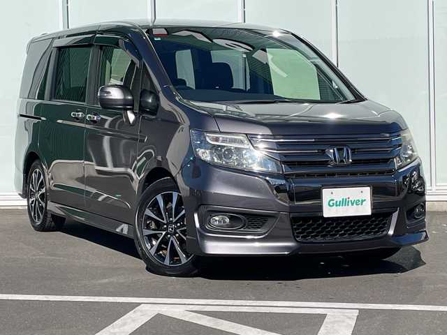 ホンダ ステップワゴン スパーダ Z クールスピリット 神奈川県 2014(平26)年 9万km モダンスティールM 純正9インチSDナビ　/CD/DVD/BT/SD/USB/フルセグTV/純正フリップダウンモニター　/バックカメラ　/パドルシフト　/クルーズコントロール　/両側パワースライドドア　/アイドリングストップ/ハーフレザーシート　/ETC　/純正フロアマット/ステアリングスイッチ/革巻きステアリング/電動格納ウインカーミラー/純正17インチアルミホイール/ABS　/横滑り防止装置　/盗難防止装置