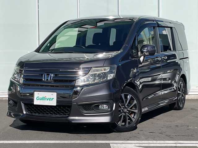ホンダ ステップワゴン スパーダ Z クールスピリット 神奈川県 2014(平26)年 9万km モダンスティールM 純正9インチSDナビ　/CD/DVD/BT/SD/USB/フルセグTV/純正フリップダウンモニター　/バックカメラ　/パドルシフト　/クルーズコントロール　/両側パワースライドドア　/アイドリングストップ/ハーフレザーシート　/ETC　/純正フロアマット/ステアリングスイッチ/革巻きステアリング/電動格納ウインカーミラー/純正17インチアルミホイール/ABS　/横滑り防止装置　/盗難防止装置