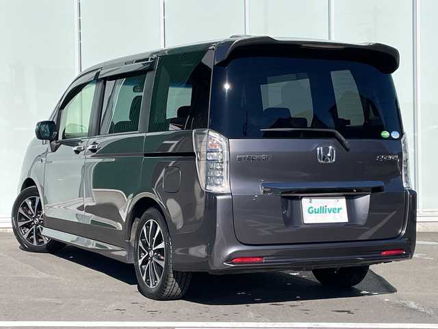 ホンダ ステップワゴン スパーダ Z クールスピリット 神奈川県 2014(平26)年 9万km モダンスティールM 純正9インチSDナビ　/CD/DVD/BT/SD/USB/フルセグTV/純正フリップダウンモニター　/バックカメラ　/パドルシフト　/クルーズコントロール　/両側パワースライドドア　/アイドリングストップ/ハーフレザーシート　/ETC　/純正フロアマット/ステアリングスイッチ/革巻きステアリング/電動格納ウインカーミラー/純正17インチアルミホイール/ABS　/横滑り防止装置　/盗難防止装置