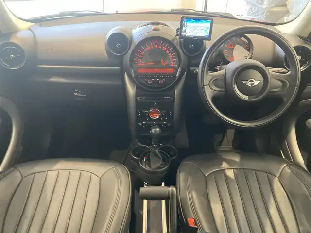 ＭＩＮＩ ミニ クロスオーバー クーパー D 熊本県 2016(平28)年 4.4万km ブレイジングレッドメタリック ・キーレス/・ポータブルナビ/・ワンセグTV/・純正CD/AUX/・ETC/・ドライブレコーダー(前後録画)/・革調シートカバー/・純正マット/・保証書/取説