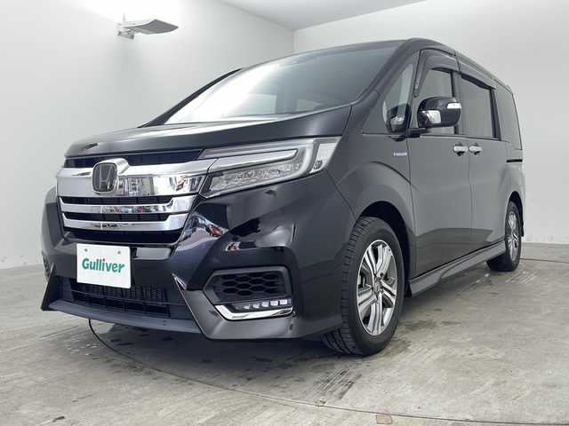 ホンダ ステップワゴン スパーダ ハイブリッド G ホンダセンシング 兵庫県 2019(令1)年 4.9万km プレミアムスパークルブラックパール 純正９インチプレミアムインターナビ　フルセグ　Ｂｌｕｅｔｏｏｔｈオーディオ　ＤＶＤ再生　ＵＳＢ　バックカメラ　アダプティブクルーズコントロール　レーンキープアシスト　両側パワースライドドア　ＬＥＤ