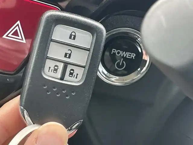 ホンダ ステップワゴン スパーダ ハイブリッド G ホンダセンシング 千葉県 2019(令1)年 4.9万km プレミアムスパークルブラックパール 純正９インチプレミアムインターナビ　/フルセグ　Ｂｌｕｅｔｏｏｔｈオーディオ　ＤＶＤ再生　ＵＳＢ　/バックカメラ　/アダプティブクルーズコントロール　/レーンキープアシスト　/両側パワースライドドア　/ＬＥＤヘッドライト/ETC/スマートキー/前後コーナーセンサー/パワーウィンドウ/パワーステアリング/ABS