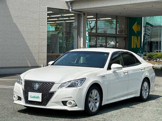 トヨタ クラウン ハイブリッド アスリートS 熊本県 2013(平25)年 6.4万km ホワイトパールクリスタルシャイン プッシュスタート/メーカーOPナビ/バックカメラ/ビルトインETC/前後ドライブレコーダー/純正17インチAW/レーダークルーズ/前席パワーシート/HIDヘッドライト/オートライト/フォグライト/前後コーナーセンサー/横滑り防止装置/ウィンカーミラー/純正フロアマット/純正ドアバイザー/新車保証書/取扱説明書/スマートスペアキー×1本