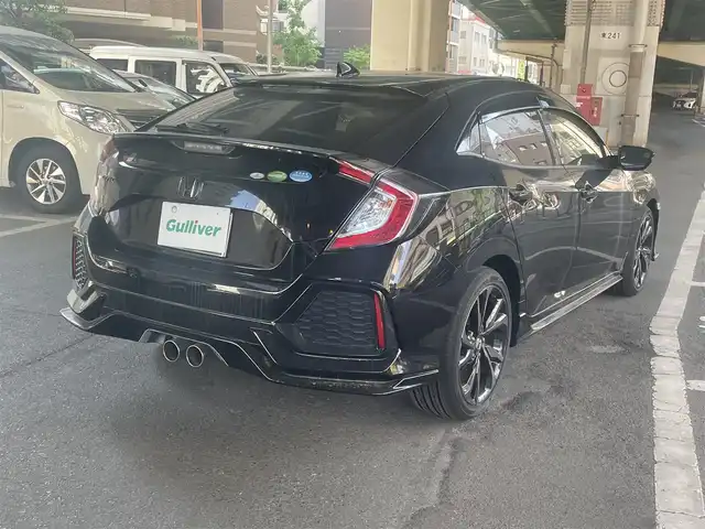 ホンダ シビック ハッチバック 大阪府 2019(令1)年 1.9万km クリスタルブラックパール ホンダセンシング/・衝突軽減ブレーキ/・路外逸脱抑制機能/・アクティブクルーズコントロール/・車線維持支援システム/・オートハイビーム/・標識認識機能/ホンダ純正メモリナビ/・Bluetooth/・バックカメラ/・CD・DVD/ホンダ純正18アルミホイール/パドルシフト/運転席＆助手席シートヒーター/マルチインフォメーションディスプレイ/オートブレーキホールド機能/電子制御パーキングブレーキ/エンジンスタート付Ｈｏｎｄａスマートキー/ワンオーナー/新車保証書/取扱説明書