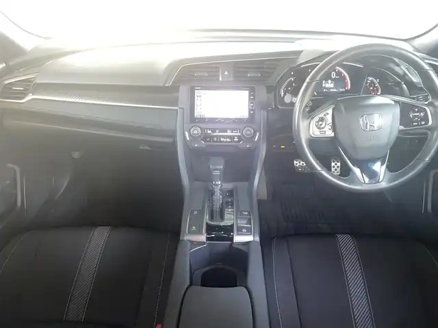 ホンダ シビック ハッチバック 大阪府 2019(令1)年 1.9万km クリスタルブラックパール ホンダセンシング/・衝突軽減ブレーキ/・路外逸脱抑制機能/・アクティブクルーズコントロール/・車線維持支援システム/・オートハイビーム/・標識認識機能/ホンダ純正メモリナビ/・Bluetooth/・バックカメラ/・CD・DVD/ホンダ純正18アルミホイール/パドルシフト/運転席＆助手席シートヒーター/マルチインフォメーションディスプレイ/オートブレーキホールド機能/電子制御パーキングブレーキ/エンジンスタート付Ｈｏｎｄａスマートキー/ワンオーナー/新車保証書/取扱説明書