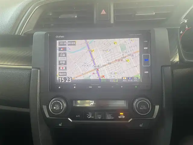 ホンダ シビック ハッチバック 大阪府 2019(令1)年 1.9万km クリスタルブラックパール ホンダセンシング/・衝突軽減ブレーキ/・路外逸脱抑制機能/・アクティブクルーズコントロール/・車線維持支援システム/・オートハイビーム/・標識認識機能/ホンダ純正メモリナビ/・Bluetooth/・バックカメラ/・CD・DVD/ホンダ純正18アルミホイール/パドルシフト/運転席＆助手席シートヒーター/マルチインフォメーションディスプレイ/オートブレーキホールド機能/電子制御パーキングブレーキ/エンジンスタート付Ｈｏｎｄａスマートキー/ワンオーナー/新車保証書/取扱説明書