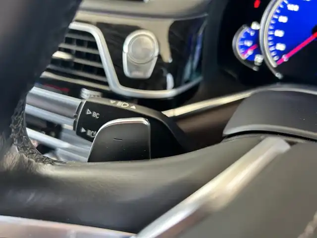 ＢＭＷ ７５０Ｌｉ Mスポーツ 茨城県 2017(平29)年 6.6万km ミネラルホワイト インテリジェントS/コンフォートA/スカイラウンジパノラマガラスサンルーフ/harman/kardon/ジェスチャーコントロール/Mスポーツエキゾースト/ブラウンレザーシート/リアモニター/純正ナビ/フルセグTV/360°カメラ/ミラー一体型ETC/全席パワーシート/全席シートヒーター/全席ベンチレーション/HUD/社外18インチAW