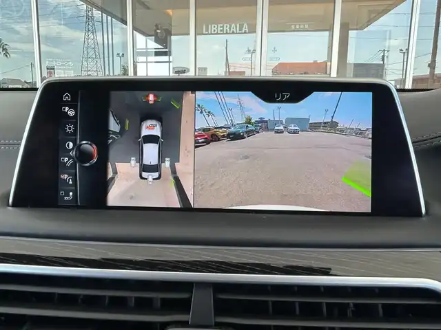 ＢＭＷ ７５０Ｌｉ Mスポーツ 茨城県 2017(平29)年 6.6万km ミネラルホワイト インテリジェントS/コンフォートA/スカイラウンジパノラマガラスサンルーフ/harman/kardon/ジェスチャーコントロール/Mスポーツエキゾースト/ブラウンレザーシート/リアモニター/純正ナビ/フルセグTV/360°カメラ/ミラー一体型ETC/全席パワーシート/全席シートヒーター/全席ベンチレーション/HUD/社外18インチAW