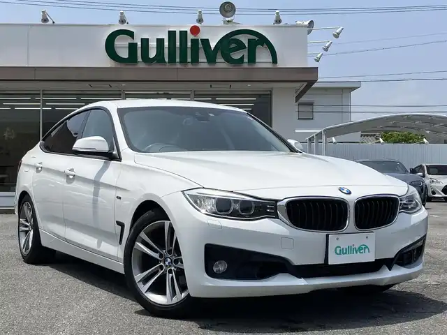 ＢＭＷ ３２０ｉ 三重県 2014(平26)年 6.3万km 白 ♪パワーバックドア/インテリジェントセーフティ/レーンディパーチャーウォーニング/純正ナビ/ ・DVD再生 ・CD録音/ ・MUSICコレクション/バックカメラ/クルーズコントロール/スマートキー/プッシュスタート/前席パワーシート(D席メモリ付)/LEDヘッドライト/フォグライト/リアフォグ/オートライト/コーナーセンサー/アイドリングストップ/純正18インチAW/ウィンカーミラー/革巻ステアリング/ステアリングスイッチ/フロアマット/スモークフィルム/電格ミラー/サイド/カーテンエアバック
