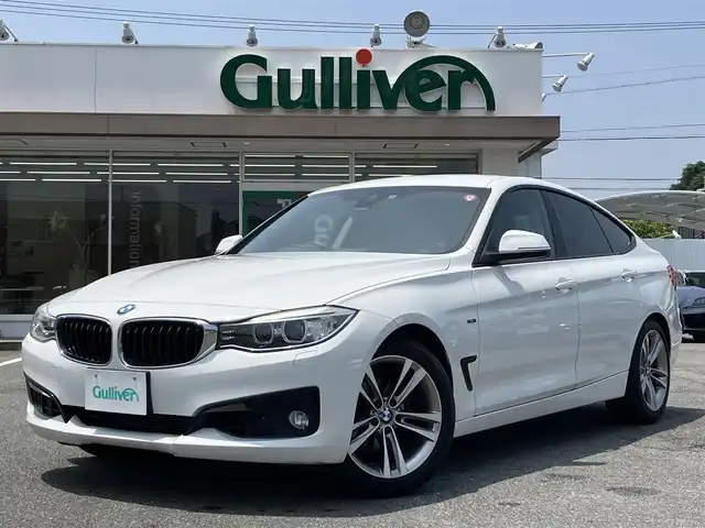 ＢＭＷ ３２０ｉ 三重県 2014(平26)年 6.3万km 白 ♪パワーバックドア/インテリジェントセーフティ/レーンディパーチャーウォーニング/純正ナビ/ ・DVD再生 ・CD録音/ ・MUSICコレクション/バックカメラ/クルーズコントロール/スマートキー/プッシュスタート/前席パワーシート(D席メモリ付)/LEDヘッドライト/フォグライト/リアフォグ/オートライト/コーナーセンサー/アイドリングストップ/純正18インチAW/ウィンカーミラー/革巻ステアリング/ステアリングスイッチ/フロアマット/スモークフィルム/電格ミラー/サイド/カーテンエアバック