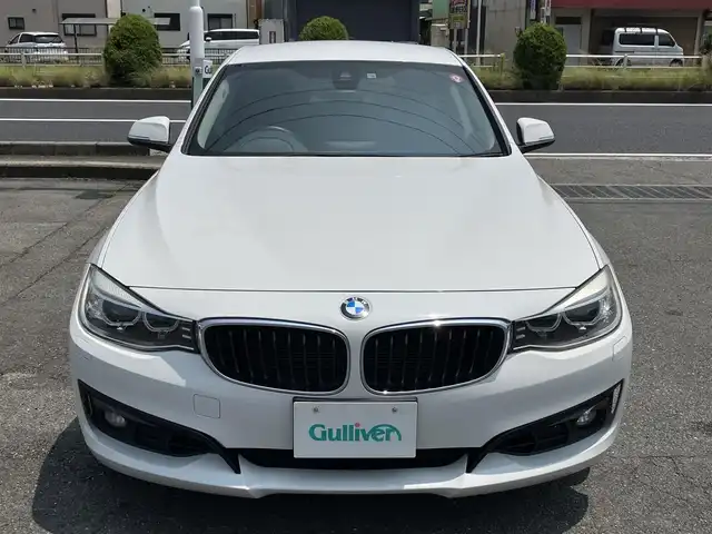 ＢＭＷ ３２０ｉ 三重県 2014(平26)年 6.3万km 白 ♪パワーバックドア/インテリジェントセーフティ/レーンディパーチャーウォーニング/純正ナビ/ ・DVD再生 ・CD録音/ ・MUSICコレクション/バックカメラ/クルーズコントロール/スマートキー/プッシュスタート/前席パワーシート(D席メモリ付)/LEDヘッドライト/フォグライト/リアフォグ/オートライト/コーナーセンサー/アイドリングストップ/純正18インチAW/ウィンカーミラー/革巻ステアリング/ステアリングスイッチ/フロアマット/スモークフィルム/電格ミラー/サイド/カーテンエアバック
