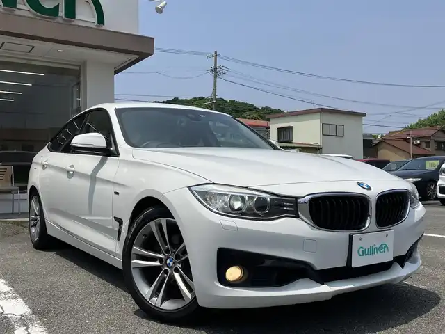 ＢＭＷ ３２０ｉ 三重県 2014(平26)年 6.3万km 白 ♪パワーバックドア/インテリジェントセーフティ/レーンディパーチャーウォーニング/純正ナビ/ ・DVD再生 ・CD録音/ ・MUSICコレクション/バックカメラ/クルーズコントロール/スマートキー/プッシュスタート/前席パワーシート(D席メモリ付)/LEDヘッドライト/フォグライト/リアフォグ/オートライト/コーナーセンサー/アイドリングストップ/純正18インチAW/ウィンカーミラー/革巻ステアリング/ステアリングスイッチ/フロアマット/スモークフィルム/電格ミラー/サイド/カーテンエアバック